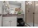 Cozy bathroom featuring a glass shower and modern black toilet at 9232 Rockport Ln, Highlands Ranch, CO 80126