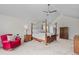 Cozy primary bedroom with a ceiling fan, ensuite bathroom, and natural light at 9232 Rockport Ln, Highlands Ranch, CO 80126