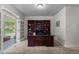 Home office with custom built-in shelving and a large desk at 9232 Rockport Ln, Highlands Ranch, CO 80126