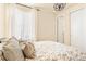 Bright bedroom with large window, closet, and comfortable decor at 10100 Isle St, Parker, CO 80134