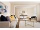 Bright living room with hardwood floors, contemporary furnishings, and stylish decor at 10100 Isle St, Parker, CO 80134