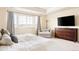 Comfortable bedroom with ample natural light, neutral tones, and updated fixtures at 10100 Isle St, Parker, CO 80134