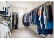 Spacious walk-in closet with organized shelving and ample hanging space at 10100 Isle St, Parker, CO 80134