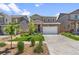 Beautiful two-story home with lush green lawn, charming landscaping, and inviting curb appeal at 15246 W 94Th Ave, Arvada, CO 80007