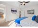 Serene main bedroom with a comfortable bed, TV, closet, soft carpet and ample light at 15246 W 94Th Ave, Arvada, CO 80007