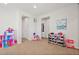 Spacious playroom with plenty of room to play and storage for easy clean-up at 15246 W 94Th Ave, Arvada, CO 80007