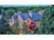 House with a deck and backyard, offering a bird's eye perspective at 3351 Oak St, Wheat Ridge, CO 80033