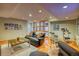Finished basement with a sitting area and exercise equipment at 3351 Oak St, Wheat Ridge, CO 80033