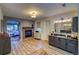 Elegant bathroom with a large vanity, a fireplace, and access to the bedroom at 3351 Oak St, Wheat Ridge, CO 80033