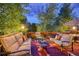Relaxing deck with outdoor furniture and lighting at 3351 Oak St, Wheat Ridge, CO 80033