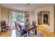 Bright dining room featuring a large window and chandelier at 3351 Oak St, Wheat Ridge, CO 80033