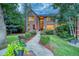 Brick house with a nicely landscaped front yard and walkway at 3351 Oak St, Wheat Ridge, CO 80033