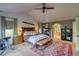 Relaxing main bedroom with ensuite bathroom access and a sitting area at 3351 Oak St, Wheat Ridge, CO 80033