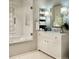 Elegant bathroom with white vanity, shower, and stylish fixtures at 4603 S Denice Dr, Cherry Hills Village, CO 80111