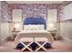 bedroom features colorful wallpaper, twin beds, and decorative lighting at 4603 S Denice Dr, Cherry Hills Village, CO 80111