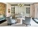 Bright home office featuring custom built-ins, modern lighting and stylish decor at 4603 S Denice Dr, Cherry Hills Village, CO 80111