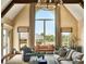 Elegant living room with high ceilings and multiple windows at 4603 S Denice Dr, Cherry Hills Village, CO 80111