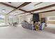 Inviting common room with fireplace, comfortable seating, and plenty of space for relaxation and socializing at 12979 W Ohio Ave, Lakewood, CO 80228