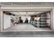 A spacious garage with ample storage space, featuring shelving and room for vehicles and other belongings at 12979 W Ohio Ave, Lakewood, CO 80228