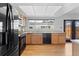 Kitchen featuring ample countertop space, wood cabinets, and stainless steel appliances at 12979 W Ohio Ave, Lakewood, CO 80228