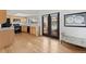 Bright eat-in kitchen with wood cabinets, stainless steel appliances, and decorative french doors at 12979 W Ohio Ave, Lakewood, CO 80228