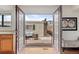 Inviting patio with French doors, showcasing comfortable seating and outdoor ambiance at 12979 W Ohio Ave, Lakewood, CO 80228