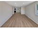 Bright and spacious living room area with sleek flooring and neutral wall paint at 6650 Depew Ct, Arvada, CO 80003