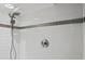 Shower boasting white subway tile with decorative tile accent and dual shower heads at 6943 Oak Way, Arvada, CO 80004