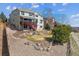 Spacious backyard with a deck and lush landscaping, perfect for outdoor entertaining at 1022 Orion Way, Castle Rock, CO 80108