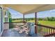 Outdoor deck offering panoramic views, complete with a grill and dining set, perfect for enjoying the outdoors at 1022 Orion Way, Castle Rock, CO 80108