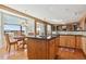 Open kitchen with a breakfast nook featuring large windows and plenty of natural light at 1022 Orion Way, Castle Rock, CO 80108