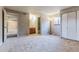 Bedroom view showcasing an ensuite bathroom, closet space and ample natural light from a window at 9402 W 89Th Cir, Broomfield, CO 80021