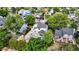 Beautiful neighborhood featuring a home with a deck and patio perfect for outdoor entertaining, surrounded by lush greenery and trees at 10635 Dexter Dr, Thornton, CO 80233