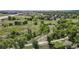 Expansive green space featuring walking paths and mature trees, offering residents a tranquil and scenic environment at 10635 Dexter Dr, Thornton, CO 80233