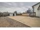Expansive backyard featuring a shed, concrete patio, and a wood fence perimeter at 1152 S Salida Way, Aurora, CO 80017