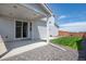Well maintained backyard features a covered patio and lush green lawn at 260 E 4Th St, Berthoud, CO 80513