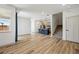 Spacious living area showcasing the kitchen, staircase, and light-filled open floor plan at 260 E 4Th St, Berthoud, CO 80513