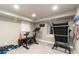 Basement gym features an exercise bike, treadmill, and free weights for a complete workout at 890 S Vine St, Denver, CO 80209