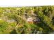 Aerial view of property features a large back yard with deck and mature trees at 41 Skyline Dr, Wheat Ridge, CO 80215