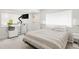 Well-lit bedroom featuring a comfortable bed and multiple windows at 41 Skyline Dr, Wheat Ridge, CO 80215