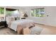 Well-lit bedroom with natural light and neutral decor at 41 Skyline Dr, Wheat Ridge, CO 80215