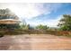 Large wood deck with railing and umbrella offers outdoor relaxation and scenic views at 41 Skyline Dr, Wheat Ridge, CO 80215