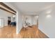 Hallway with neutral paint, hardwood flooring, and lots of open space at 41 Skyline Dr, Wheat Ridge, CO 80215