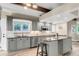 Updated kitchen with granite counters, tile backsplash, and stainless-steel appliances at 41 Skyline Dr, Wheat Ridge, CO 80215