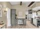 Stylish kitchen featuring custom cabinetry, stainless steel appliances, and granite countertops at 41 Skyline Dr, Wheat Ridge, CO 80215