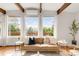 Bright living room featuring a large window with natural light and hardwood floors at 41 Skyline Dr, Wheat Ridge, CO 80215