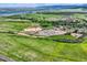 Beautiful aerial view of parking lot and open green space, and mountains in the distance at 8915 S Field Ct, Littleton, CO 80128