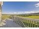 Expansive deck offers stunning panoramic views of the surrounding landscape, perfect for outdoor relaxation at 8915 S Field Ct, Littleton, CO 80128