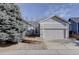 Ranch style home with attached garage and landscaping at 3711 Bucknell Cir, Highlands Ranch, CO 80129