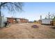 Large backyard with patio area and space for outdoor entertaining, awaiting your personal touch at 12024 W Maryland Dr, Lakewood, CO 80228